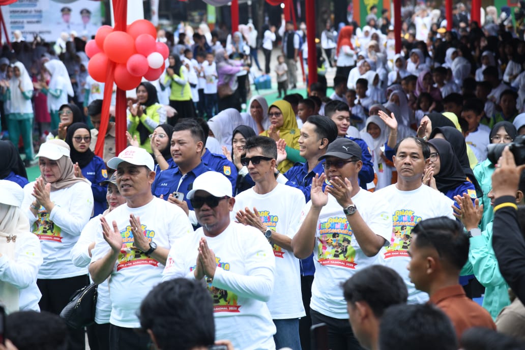 Bupati Kasmarni Dukung Komitmen Perlindungan Anak di Peringatan HAN 2025